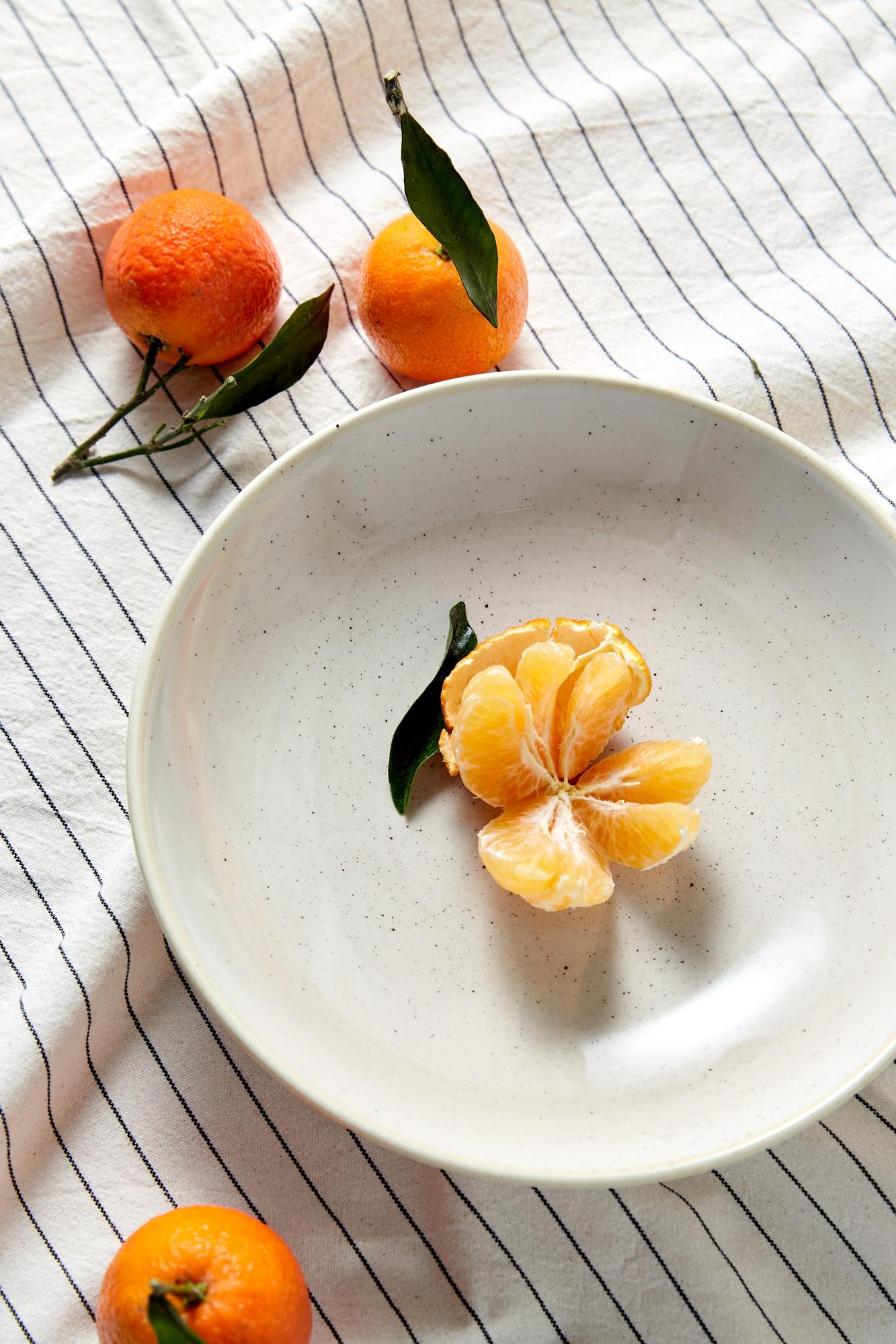 small plated dessert with citrus